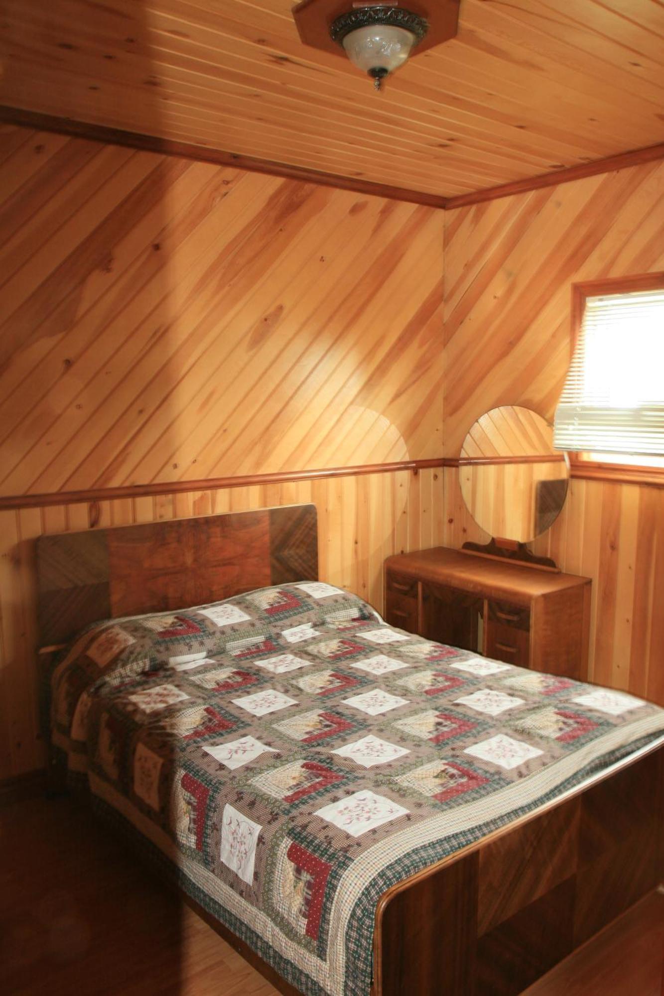 Motel Et Chalets Bo-Fleuve Evangeline Saint-Siméon Quarto foto